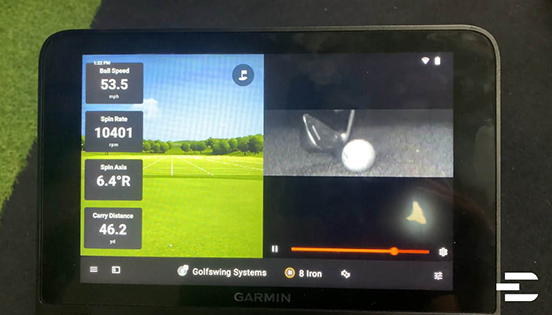 Garmin Approach R50 split-screen view showing ball flight metrics and slow-motion video of club impact for an 8 iron shot.