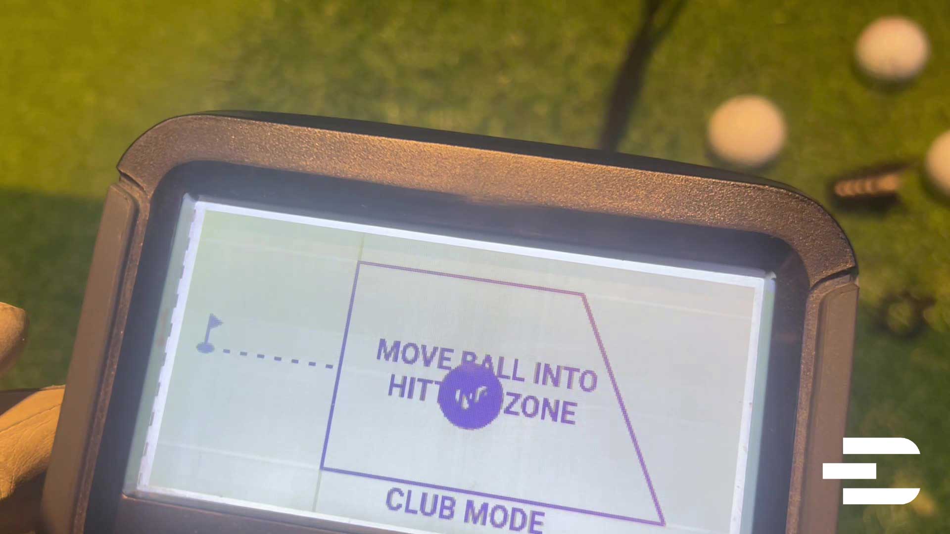 Bushnell Launch Pro screen showing ball placement prompt within 7x10 inch hitting zone.