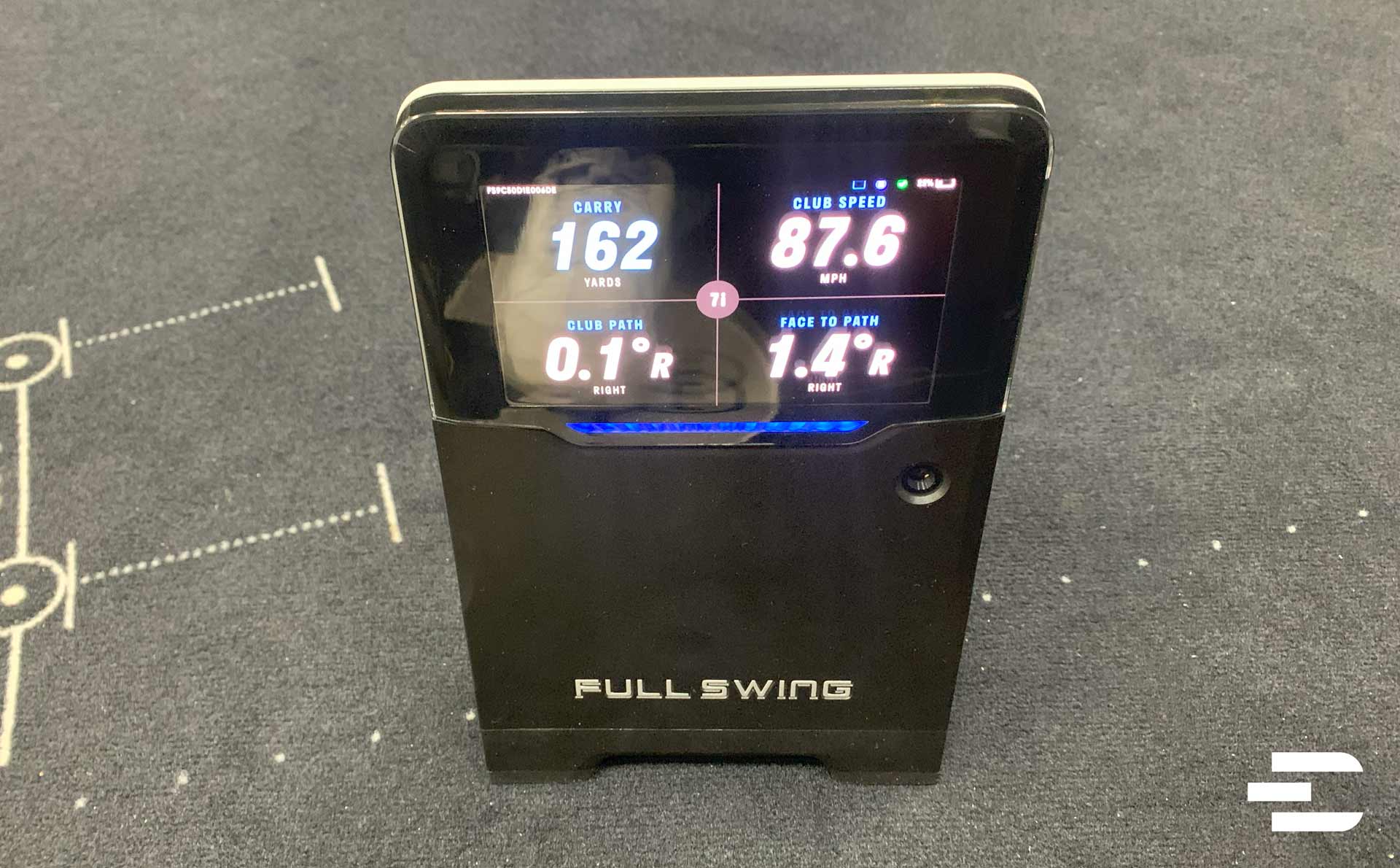Full Swing KIT launch monitor showing shot data on its inbuilt display screen.
